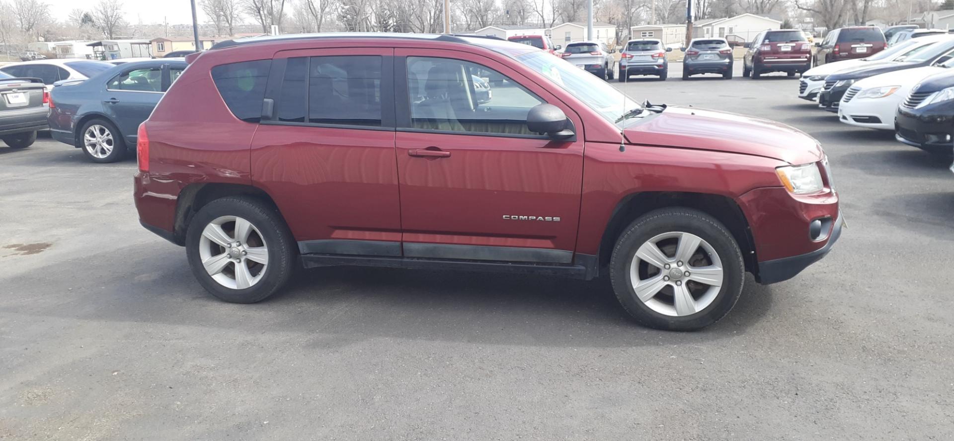 2011 Jeep Compass Sport FWD (1J4NT1FB0BD) with an 2.4L L4 DOHC 16V engine, 5-Speed Manual transmission, located at 2015 Cambell Street, Rapid City, SD, 57701, (605) 342-8326, 44.066433, -103.191772 - CARFAX AVAILABLE - Photo#4